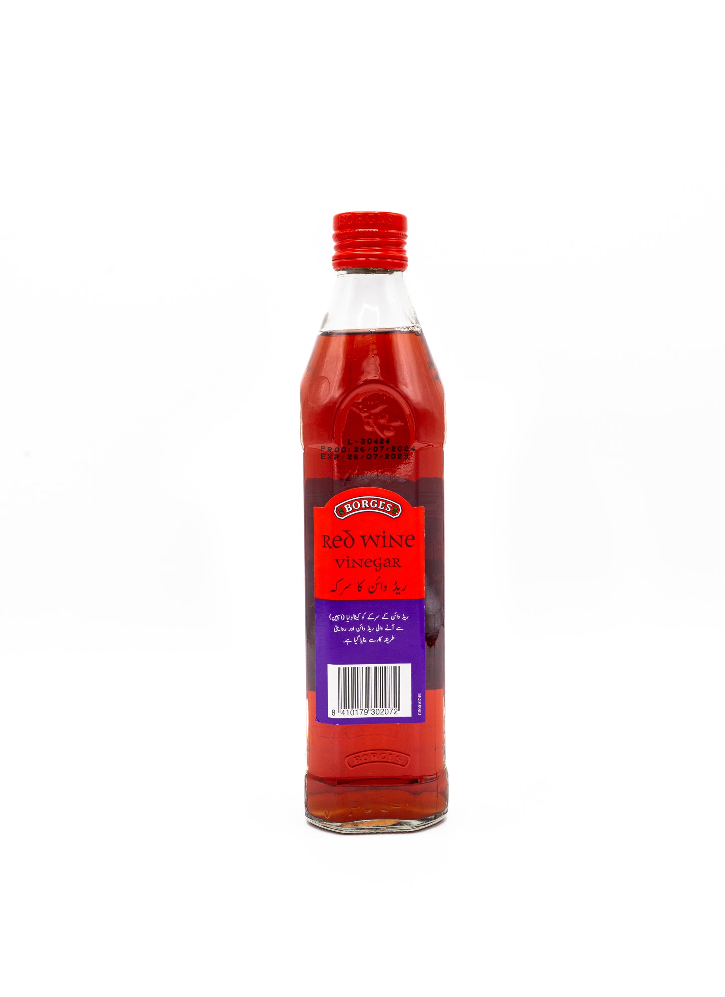 Bottle of red wine vinegar with a red cap on a white background