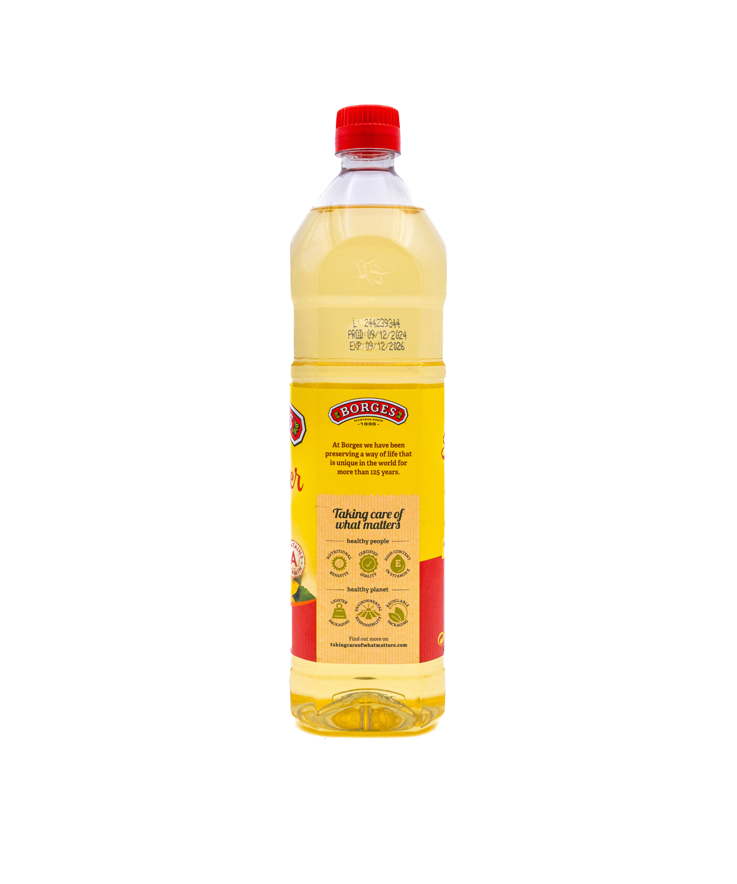 Bottle of cooking oil with a red cap on a white background